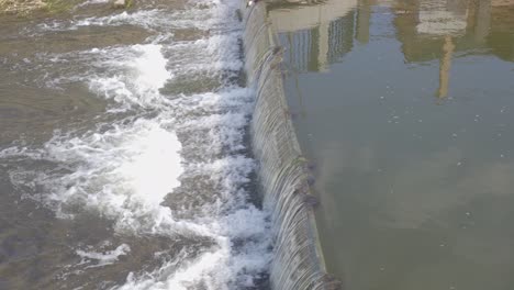 Flowing-water-in-an-urban-district-of-the-city