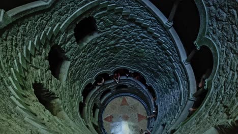 Static-shot-of-spiral-staircase-of-well-shaft-of-Quinta-da-Regaleira-in-Portugal