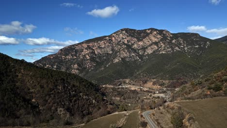 Aerial-Drone-panoramic-landscape-hills,-skyline-clouds-at-Arseguell-Lerida-Spain