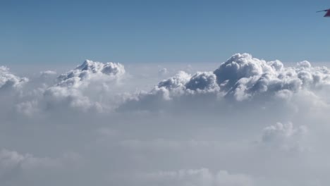 A-very-cool-scene-is-seen-from-the-plane-where-the-clouds-are-seen-scattered-around