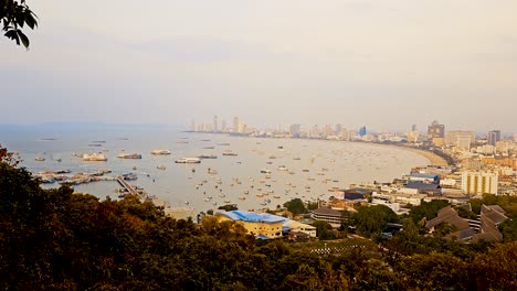 Sunset-timelapse-over-Pattaya-cityscape-showing-vibrant-skies-and-bustling-streets,-aerial-view,-in-amazing-Thailand