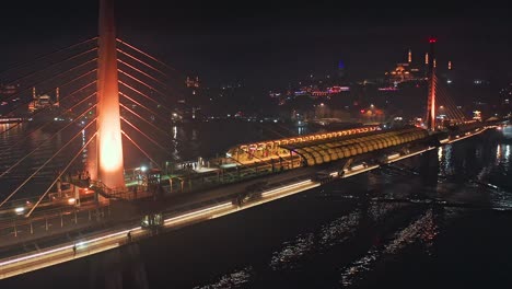 Closeup-drone-flight-nearby-Haliç-Metro-Köprüsü-cable-stayed-Bridge-above-strait-between-Beyoğlu-and-Eminönü-districts