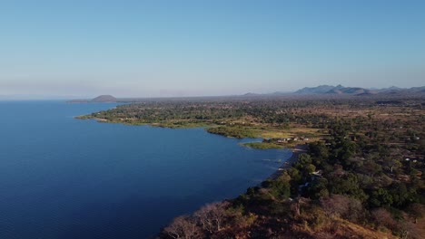 Flying-over-the-amazing-views-of-Malawi-Lake,-in-Malawi,-AFRICA