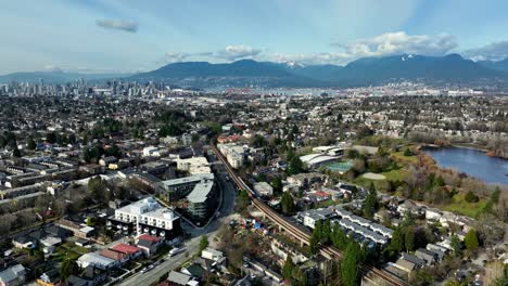 Aerial-View-Over-Neighborhood-In-Victoria-Dr-And-Kingsway-In-Vancouver,-Canada---Drone-Shot