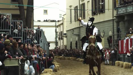 Su-Componidori-horse-riding-at-the-Sartiglia-feast-and-parade,-Oristano-carnival,-Sardinia,-Italy-Slow-motion