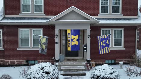 Go-Blue-Flags-on-door-of-house