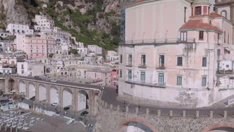Drone-shot-over-Amalfi,-Italy-on-a-clear-day