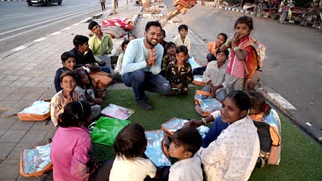 Cinematic-Shot-Slum-area-boys-are-being-taught-by-a-brother-in-a-cool-way-and-many-boys-are-also-studying