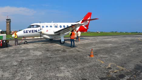 View-from-the-airport-runway,passengers-enter-at-the-plane-that-connects-São-Tomé-to-prince-Island,Africa