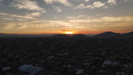 Glow-over-Ecatepec,-the-afternoon-descends-on-the-urban-expanse-of-Mexico-City