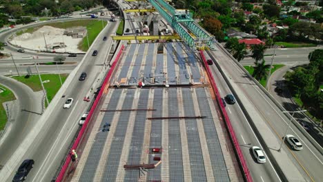 Drone-shot-of-Bridge-construction-in-the-city-of-Miami,-Florida