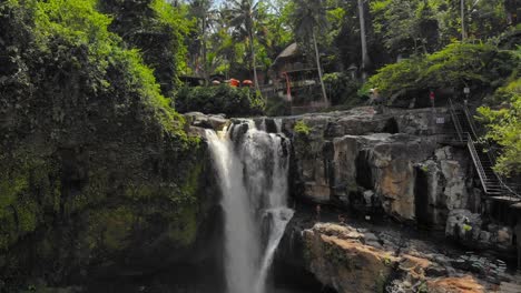 Tegenungan-Waterfall-In-The-Forest-In-Bali,-Indonesia---Drone-dolly-Shot