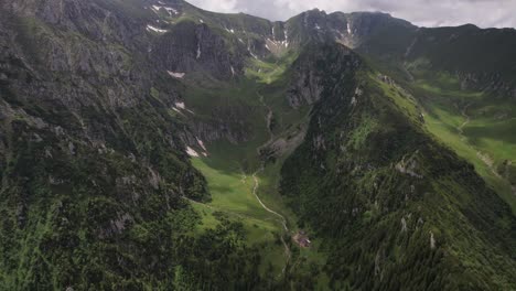 Breathtaking-aerial-shot-of-Malaiesti-Valley-in-Bucegi-Mountains,-lush-greenery,-summer