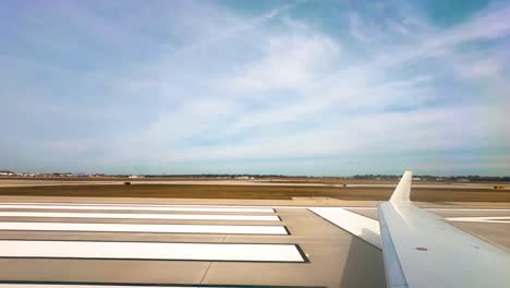 Wing-of-Airplane-as-it-takes-off-from-Milwaukee-Mitchell-International-Airport