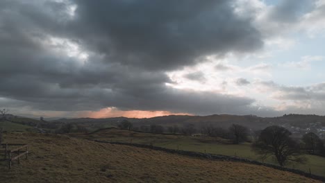 Timelapse-of-the-setting-sun-in-the-agricultural-village-in-Windermere,-located-at-the-Lake-District-National-Park,-in-Cumbria-District-in-United-Kingdom
