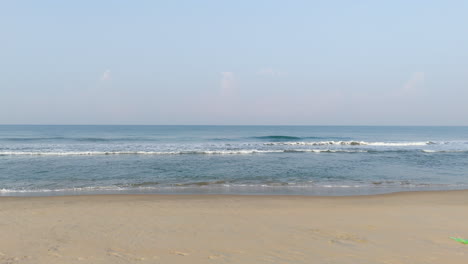 Morning-on-the-beach,-sand,-palm-trees-and-the-sea