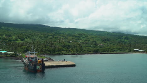 Boat-cruise-Fiji-sea-port-marina-Garden-Island-Taveuni-Island-Pacific-Ocean-shoreline-beach-front-jungle-rainforest-Christian-Catholic-Cross-on-hillside-Viti-Levu-Group-landscape-nature-static-slide