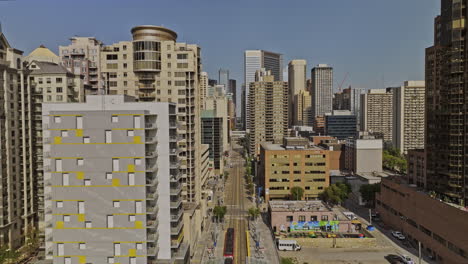 Calgary-AB-Canada-Aerial-v32-cinematic-drone-flyover-7-Ave-SW-across-downtown-area-capturing-urban-cityscape-with-mix-developments-and-ctrain-light-rail-street---Shot-with-Mavic-3-Pro-Cine---July-2023