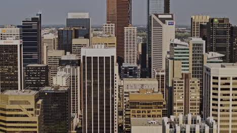 Calgary-AB-Canada-Aerial-v44-zoomed-tracking-shot,-drone-flyover-West-End-capturing-cityscape-of-Downtown-Commercial-and-riverside-Eau-Claire-neighbourhood---Shot-with-Mavic-3-Pro-Cine---July-2023