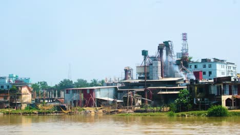 Smog-From-The-Industrial-Factory-On-The-Riverbanks-In-Bangladesh,-South-Asia