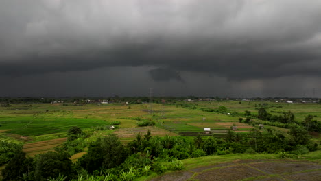 Thunderstorm-At-Rice-Plantation-With-Dark-Clouds-In-The-Sky-in-Bali,-Indonesia