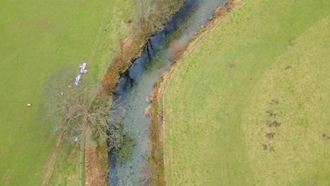 Above-View-Of-Narrow-River-Near-Mountain-Village-Of-Grasmere-In-Lake-District,-Cumbria,-England