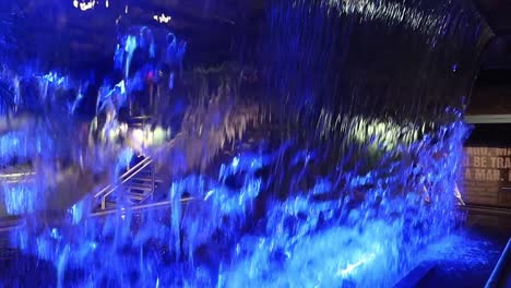 Waterfall-exhibit-at-the-Guinness-Storehouse-with-blue-lighting,-Dublin