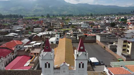 Aerial-view-of-Machachi-Catholic-Church-in-Pichincha-province,-Ecuador