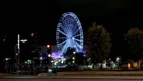 Wheel-of-Liverpool,-England-UK-at-Night,-Street-Traffic-and-Lights