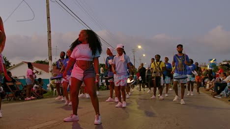Dolly-to-Carnival-dance-performers-drumming-and-dancing-to-the-contagious-beat-at-sunset