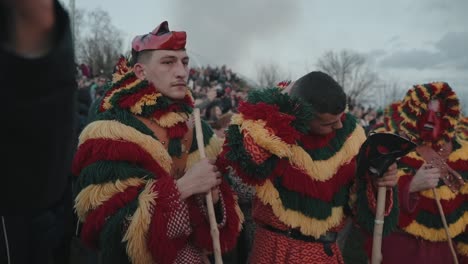 Caretos-with-vivid-fringes-in-Podence-ritual-of-the-burning-careto,-Portugal