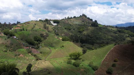 Aerial-View,-Rural-Landscape-and-Agricultural-Fields-in-Guatape-Region,-Colombia