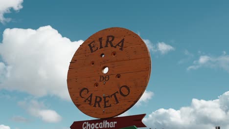 Careto-Themed-Signage-Against-Blue-Sky,-Podence-Portugal