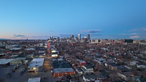 Panoramic-aerial-ascend-over-suburban-neighborhood-outside-of-Denver-colorado-main-downtown-city-center