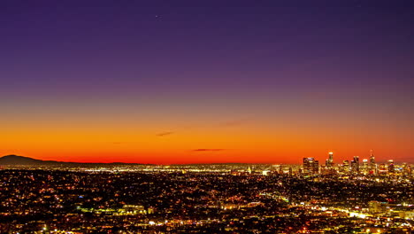 Los-Angeles-Skyline-From-Night-To-Sunrise-From-Kenneth-Hahn-View-Point-In-California,-USA
