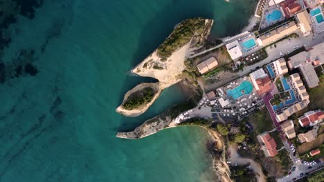 Rotating-Top-View-of-Kanali-tou-Erota-and-Canal-d'Amour-Beach-in-Sidari,-Greece