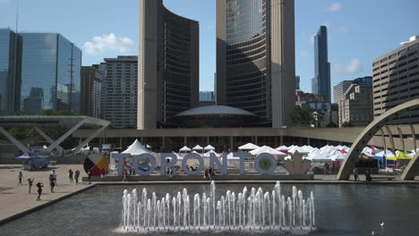 Wide-static-daytime-shot-of-Nathan-Phillips-Square-in-Toronto