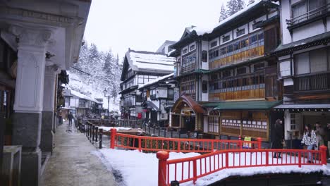 Slow-motion-4k-Pan-establishing-shot-of-Ginzan-Onsen-Hotels-and-Traditional-Hot-Springs