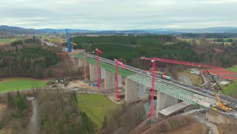 Industrial-Cranes-At-The-New-Highway-Bridge-Adjacent-To-Aurach-Bridge-In-Austria