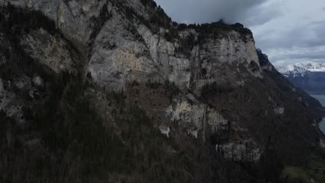 Aerial-shot-of-details-of-cliff-of-a-hill-in-Walensee,-Switzerland