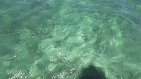 Pov-Sail-on-shallow-water-Turquoise-Caribbean-Sea,-Los-Roques-Venezuela