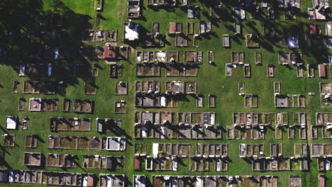 Aerial-drone-top-down-shot-descending-lower-of-a-graveyard-cemetery-in-Australia