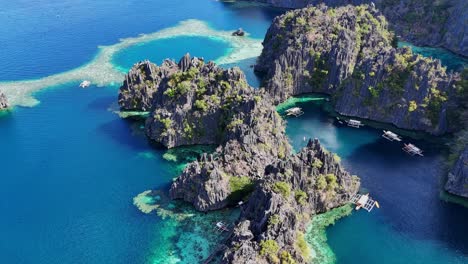 Drone-footage-turquoise-lagoons-and-cliffs-on-Coron-island-in-the-Philippines