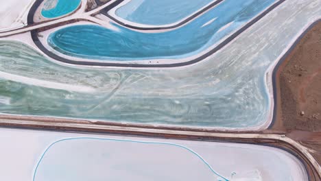 A-spectacular-4K-drone-shot-of-the-Potash-Evaporation-Ponds-in-Moab,-Utah