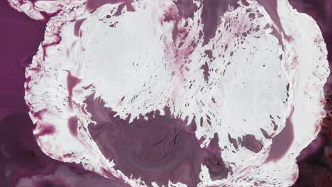 Abstract-rupture-of-bright-white-matter-in-pink-fluid