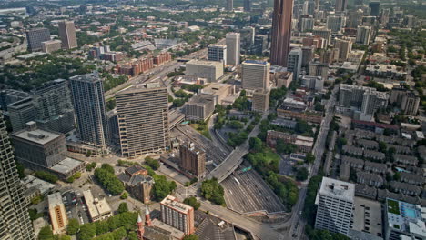 Atlanta-Georgia-Aerial-v894-hyperlapse-drone-flyover-Sono-and-downtown,-capturing-freeway-traffics-and-urban-cityscape-with-motion-of-clouds-casting-shadows---Shot-with-Mavic-3-Pro-Cine---July-2023