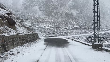 POV-Walking-Along-Road-Through-Skardu-City-Village-Town-On-Cold-Snow-Winters-Day