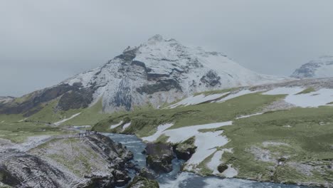 Aerial-forward-shot-of-Haífoss-hike-in-Iceland,-winter-time