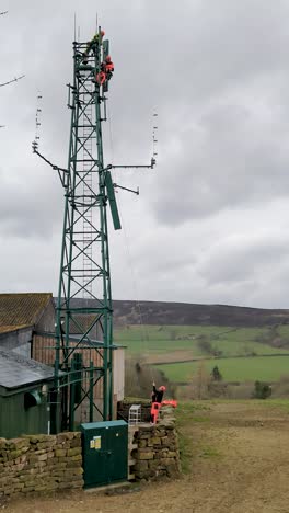 Vertical-phone-video-of-special-moment-as-antennas-for-mobile-phone-are-installed-in-a-notspot-area-with-no-coverage---in-the-North-York-Moors