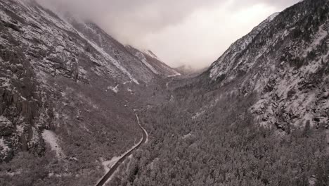 snow-storm-Aerial-view-of-road-through-canyon-in-Utah